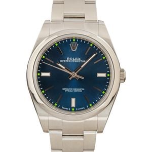 Rolex Oyster Perpetual ref 114300 Blue Dial