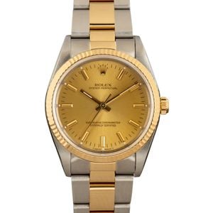 Pre-Owned Rolex Oyster Perpetual 14233 Champagne Dial