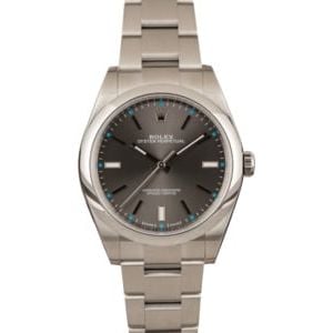 Used Rolex Oyster Perpetual 114300 Dark Rhodium w/ Blue Accents