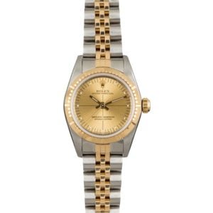 Rolex Oyster Perpetual 76243 Champagne Quadrant Dial